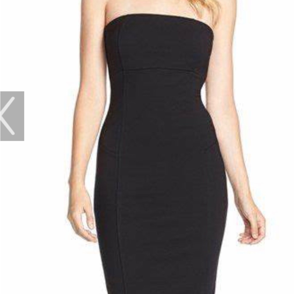Strapless and sexy black dress.